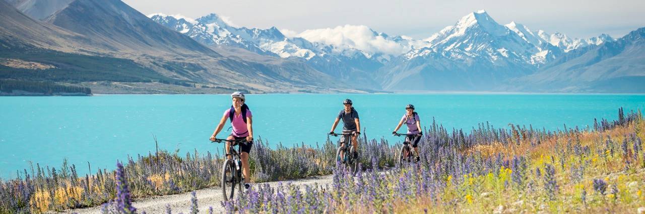 Cycling alongside Lake Pukaki